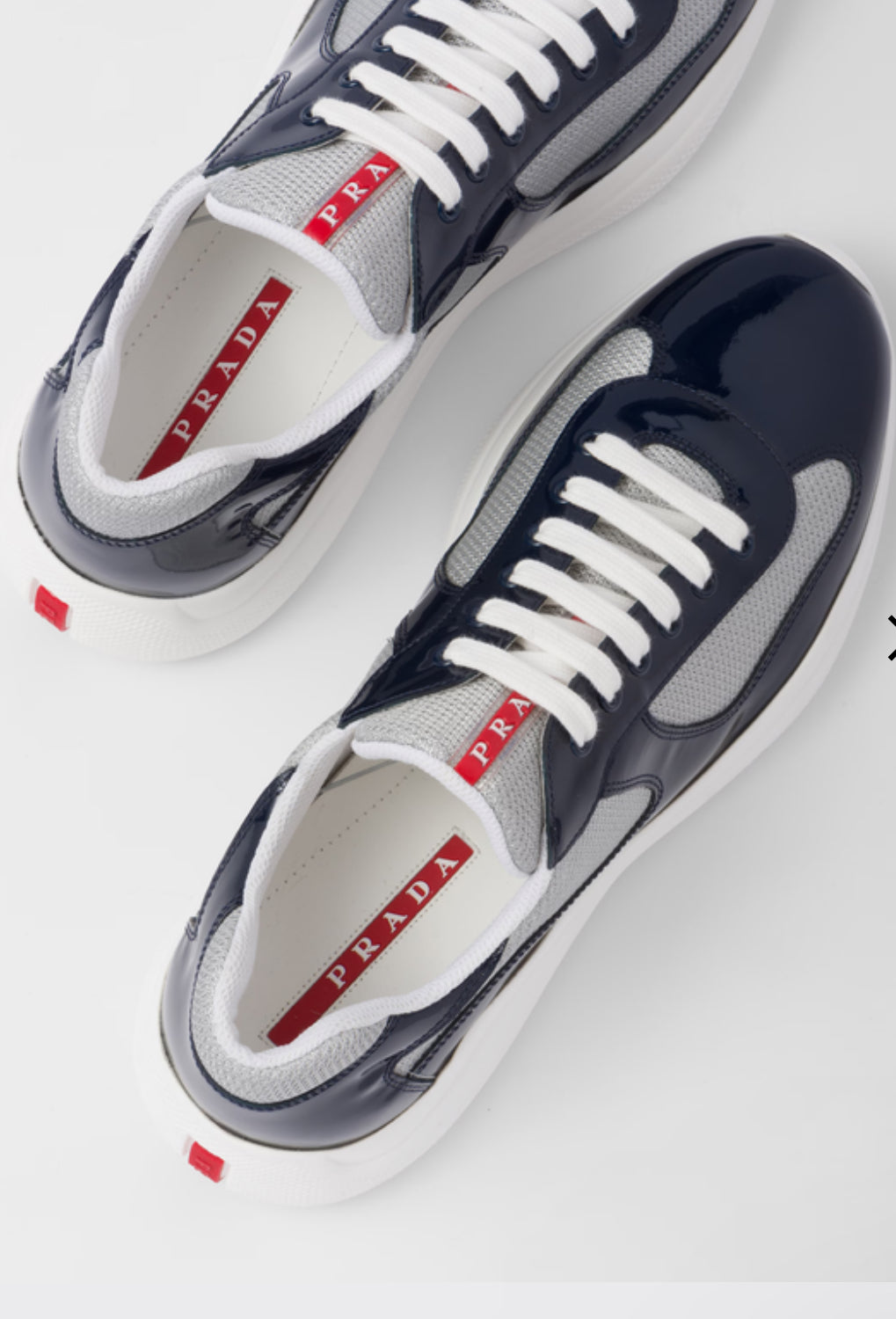 Prada Sneakers America’s Cup en cuir verni et tissu technique
